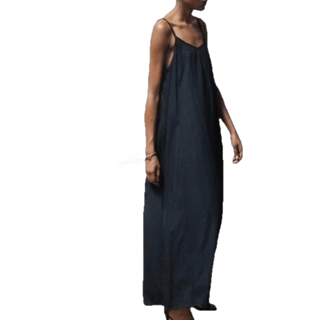 Black Cami Maxi Dress featuring an a-line silhouette, side seam pockets, and a center front seam detail.