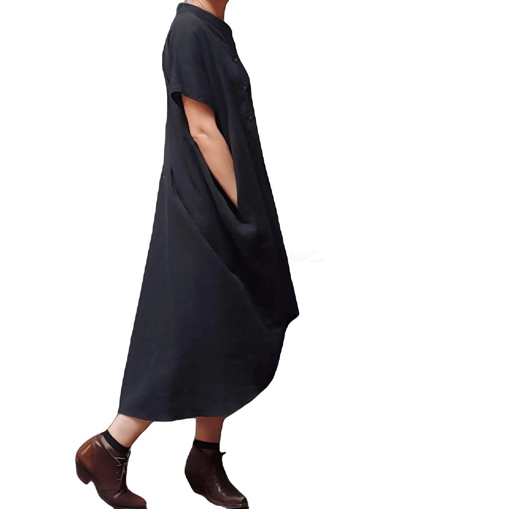 Side view of model in McCULLOUGH Geode Henley dress in black gauze at Harkensback.