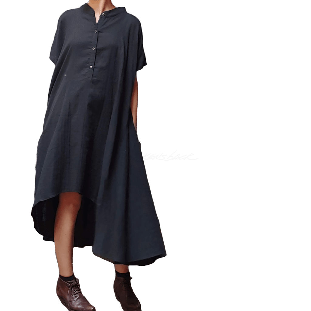 Model in McCULLOUGH Geode Henley dress in black double gauze at Harkensback.
