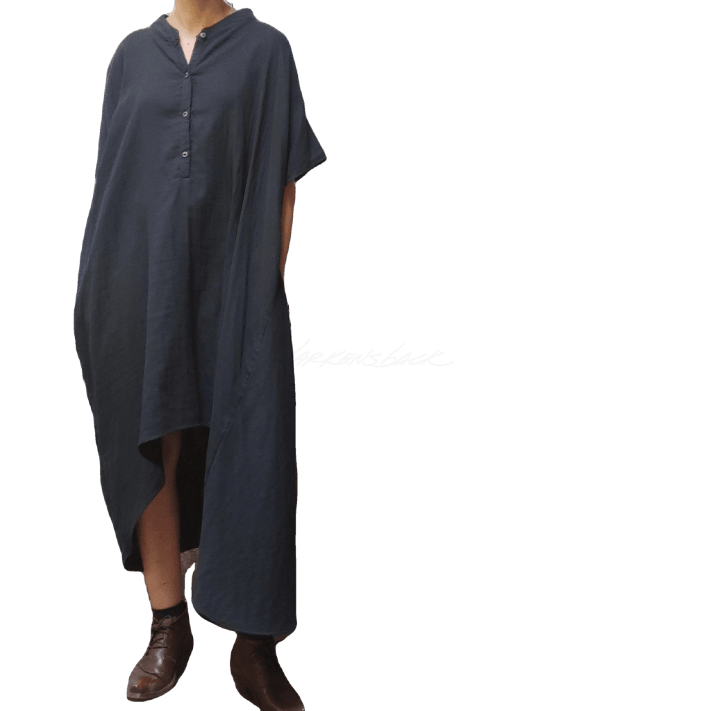 Model in McCULLOUGH Geode Henley dress in black double gauze at Harkensback.