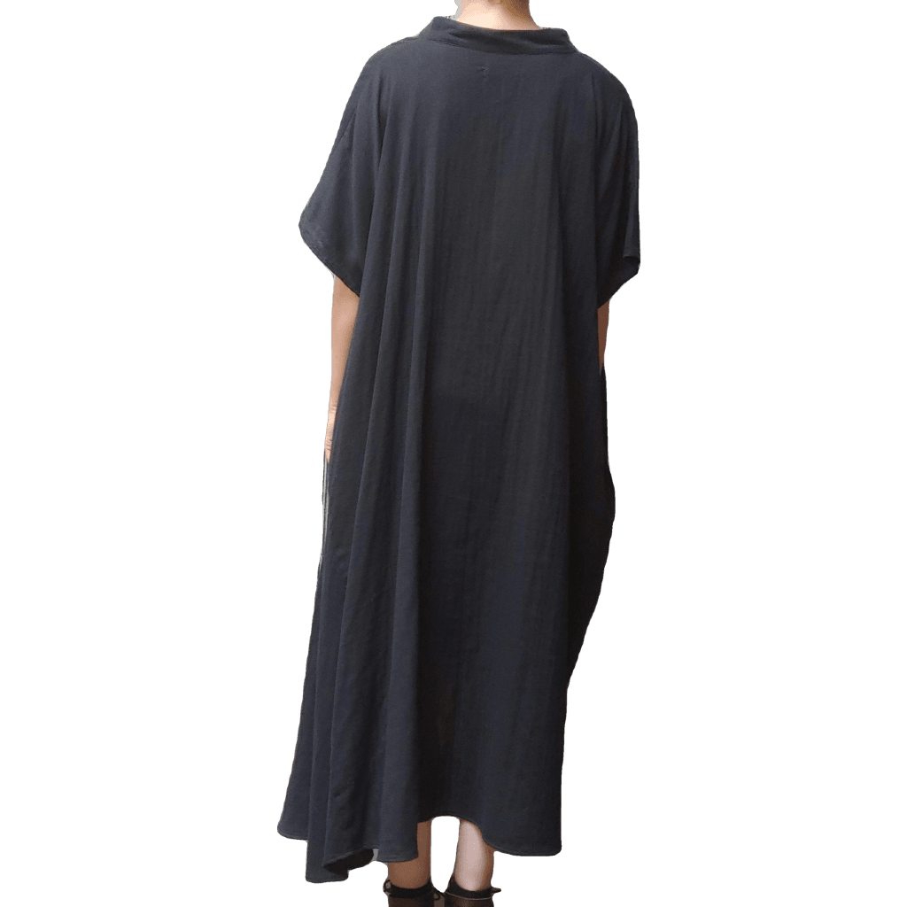 Back view of model in McCULLOUGH Geode Henley dress in black gauze at Harkensback.