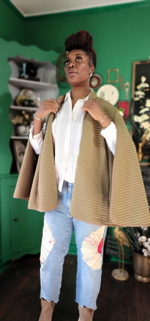 Open Sleeve Quilted Cape Apparel Jacket
