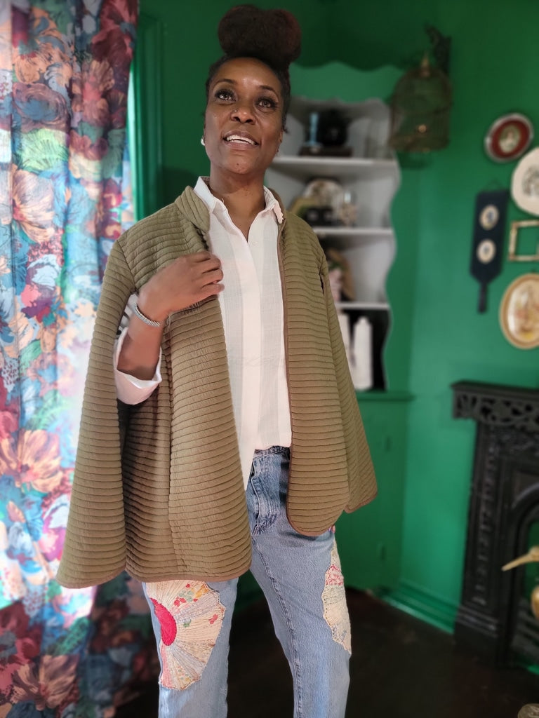 Open Sleeve Quilted Cape Apparel Jacket