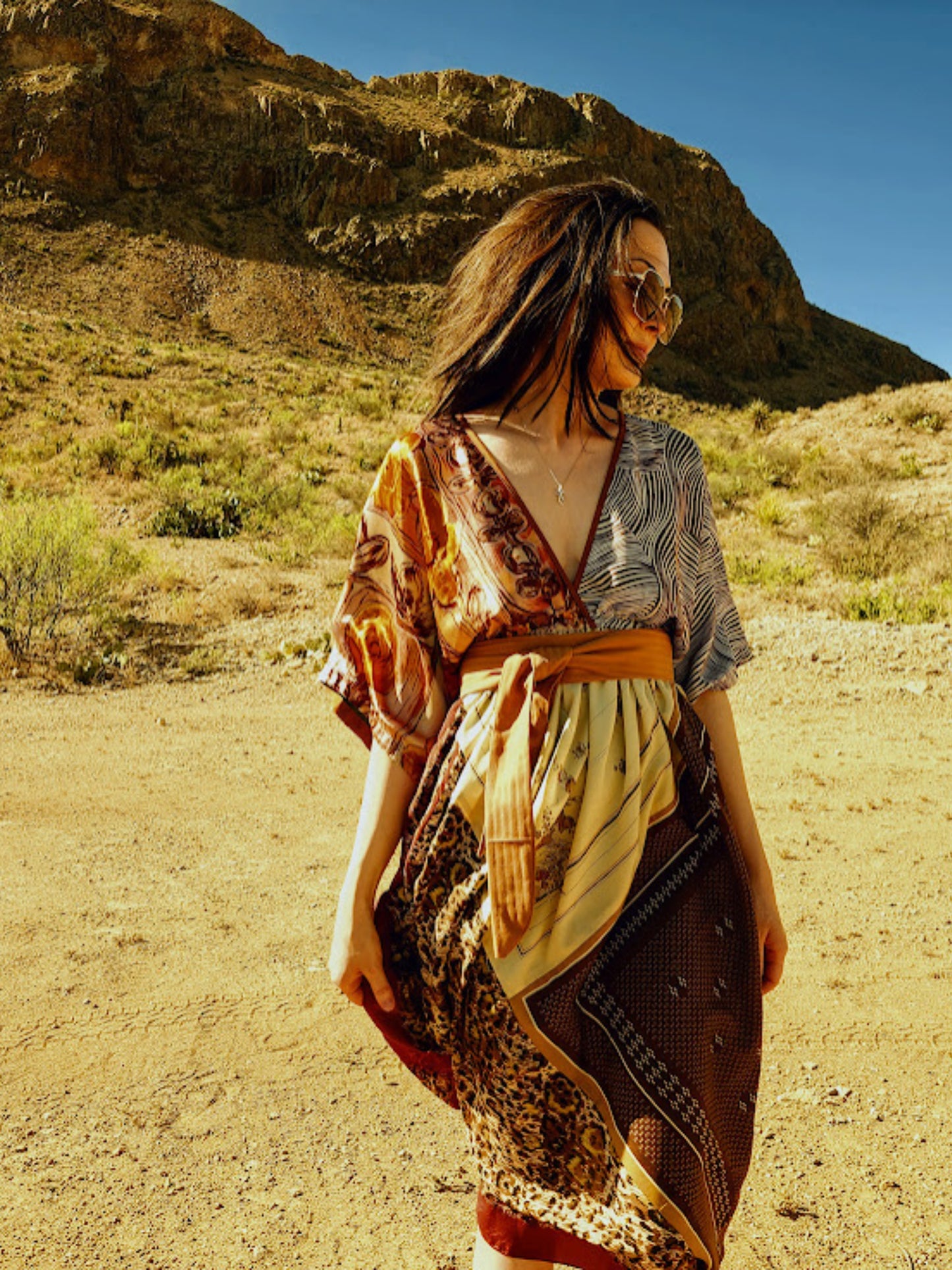 Vintage Scarf Midi Dress featuring a deep V-neck and kimono-inspired sleeves. Hidden adjustable empire waist. Desert Colors