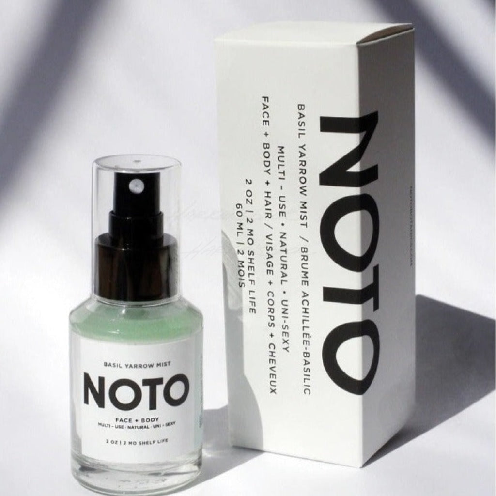 NOTO Basil Yarrow Mist in glass bottle with black cap displayed next to white product box with black lettering.