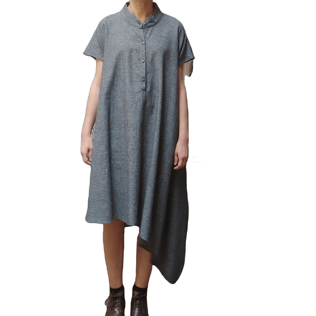 Model in McCULLOUGH Short Sleeve Asymmetric Henley Tunic in gray linen at Harkensback.