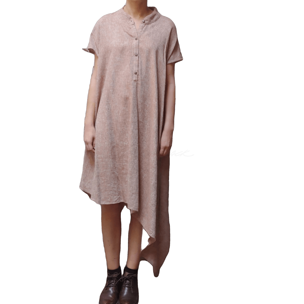 Model in McCULLOUGH Short Sleeve Asymmetric Henley Tunic in rose linen at Harkensback.